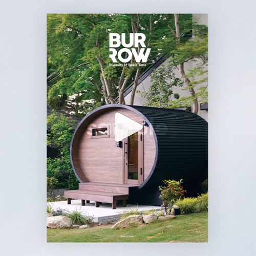 BURROWルックブック最新版の表紙。庭に設置されたオーバルサウナと黒い外壁の建物